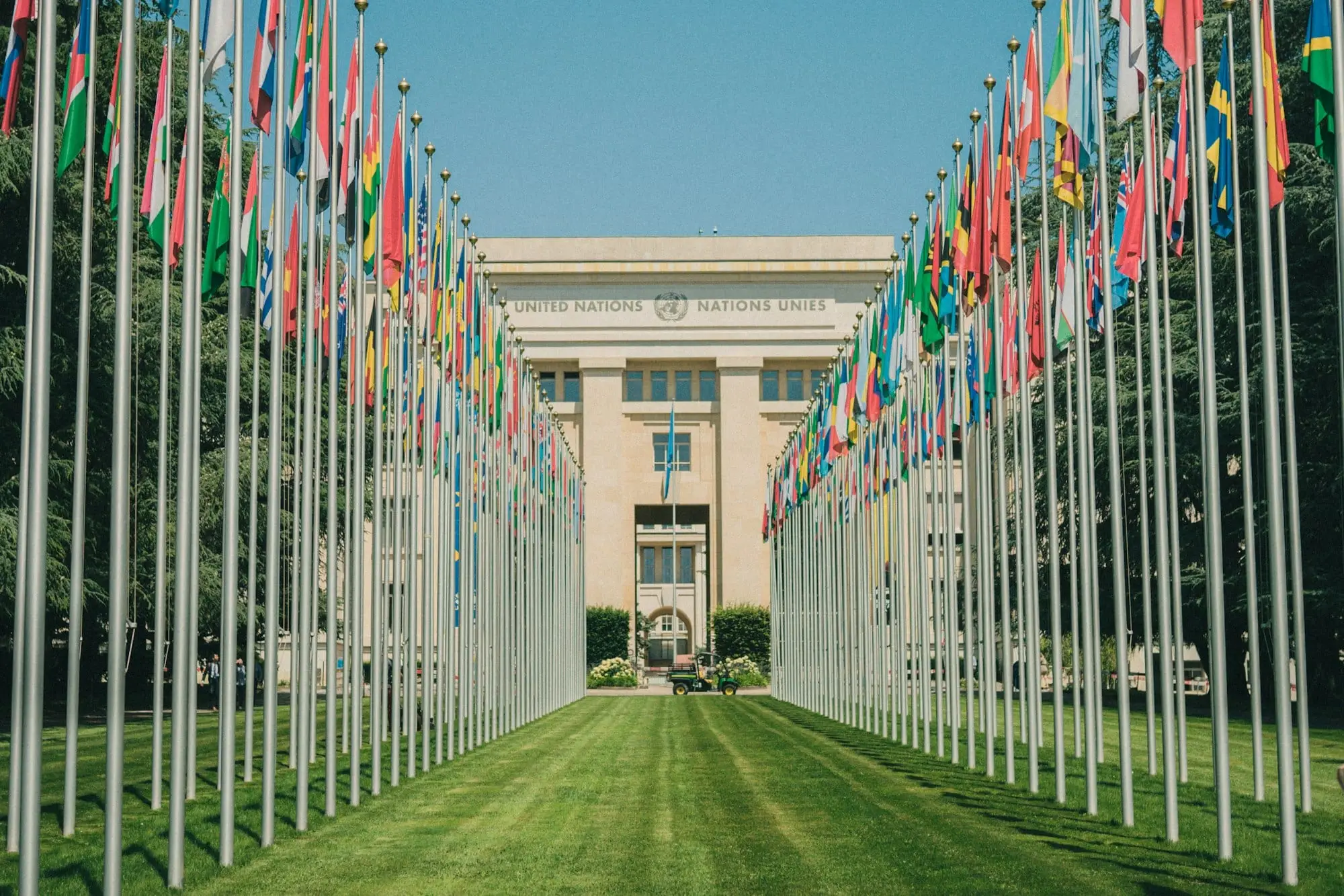 A long avenue of national flags leading to the United Nations building in Geneva